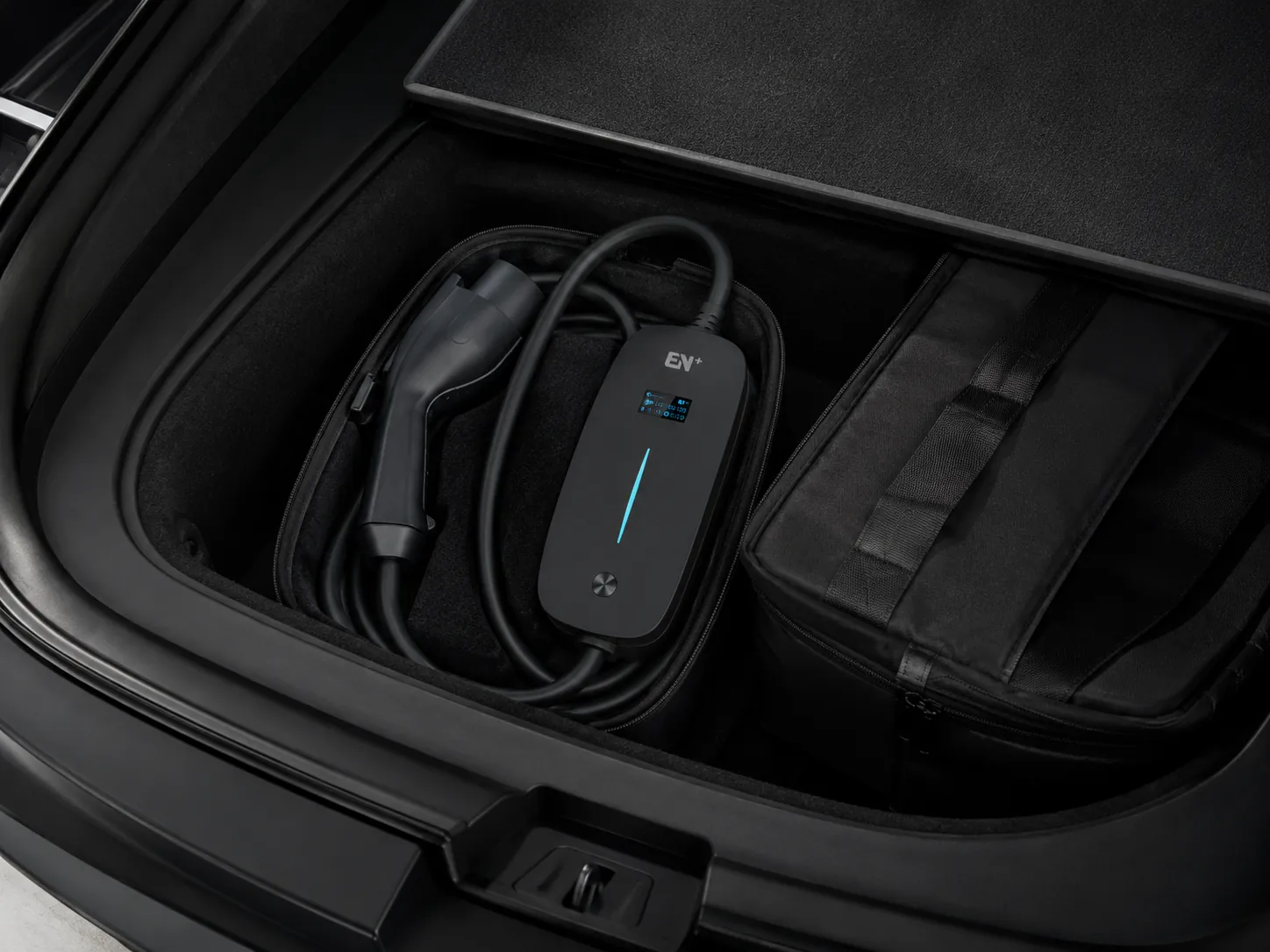 Memo portable EV charger stored compactly for in-vehicle backup charging use